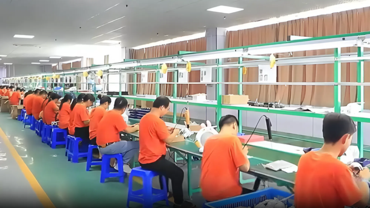 Final assembly line inside the woCyber mass-production site in Shenzhen