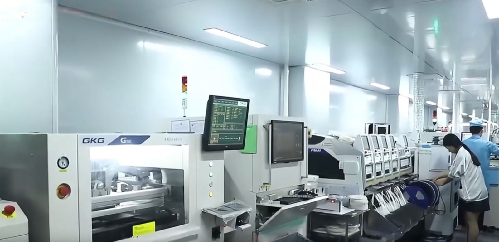 SMT line with solder paste printer and placement machines in the woCyber facility
